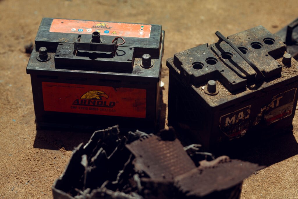 Lead exposure danger for Ghana battery and paint workers handling toxic materials without protective equipment