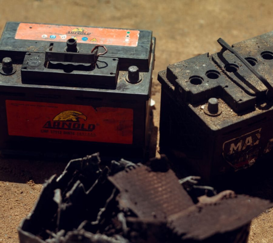 Lead exposure danger for Ghana battery and paint workers handling toxic materials without protective equipment