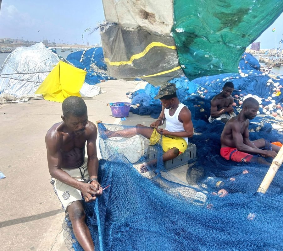 Fishermen-mending-their-nets-Afia-Agyapomaa-Ofosu-scaled