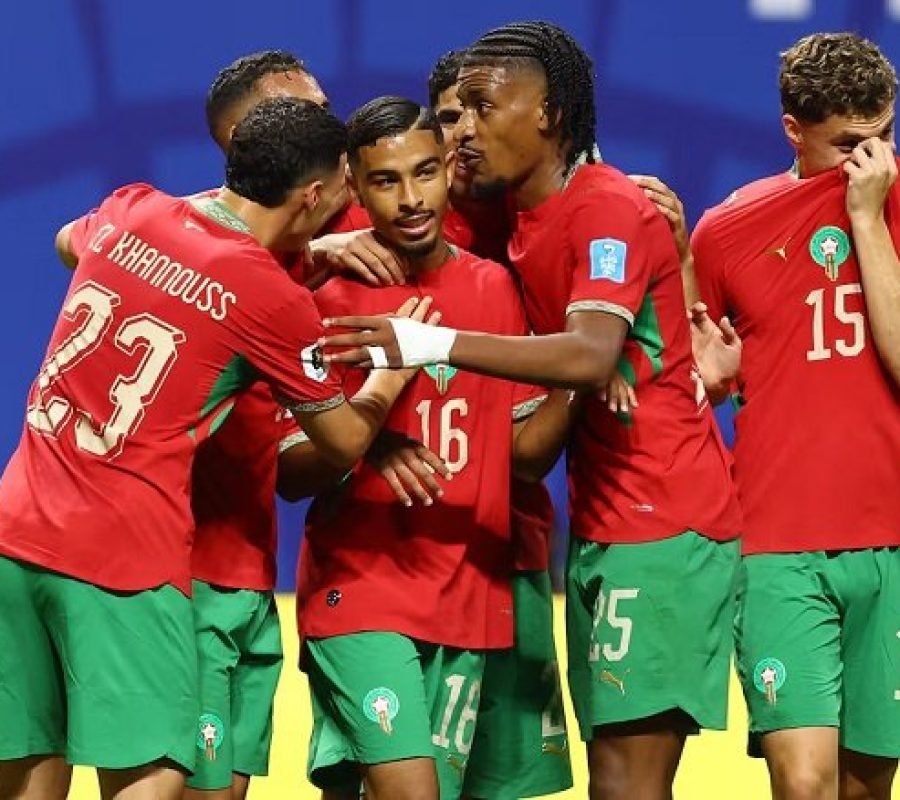 Gessime-Yassine-celebrates-scoring-their-fourth-goal-with-teammates