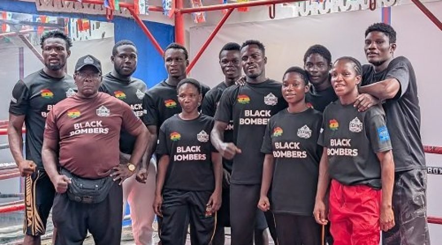 Members-of-the-Black-Bombers-with-head-coach-Asare-left