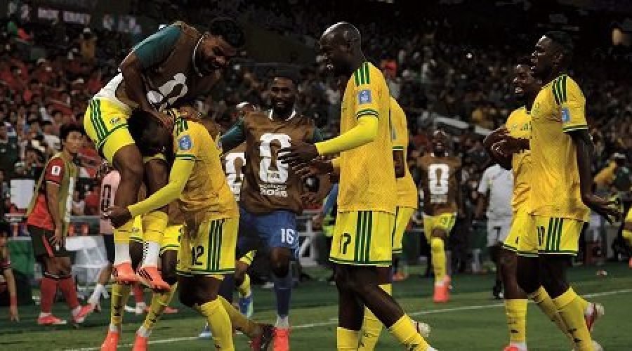 Thapelo-Maseko-is-mobbed-by-his-team-mates-after-scoring-the-only-goal