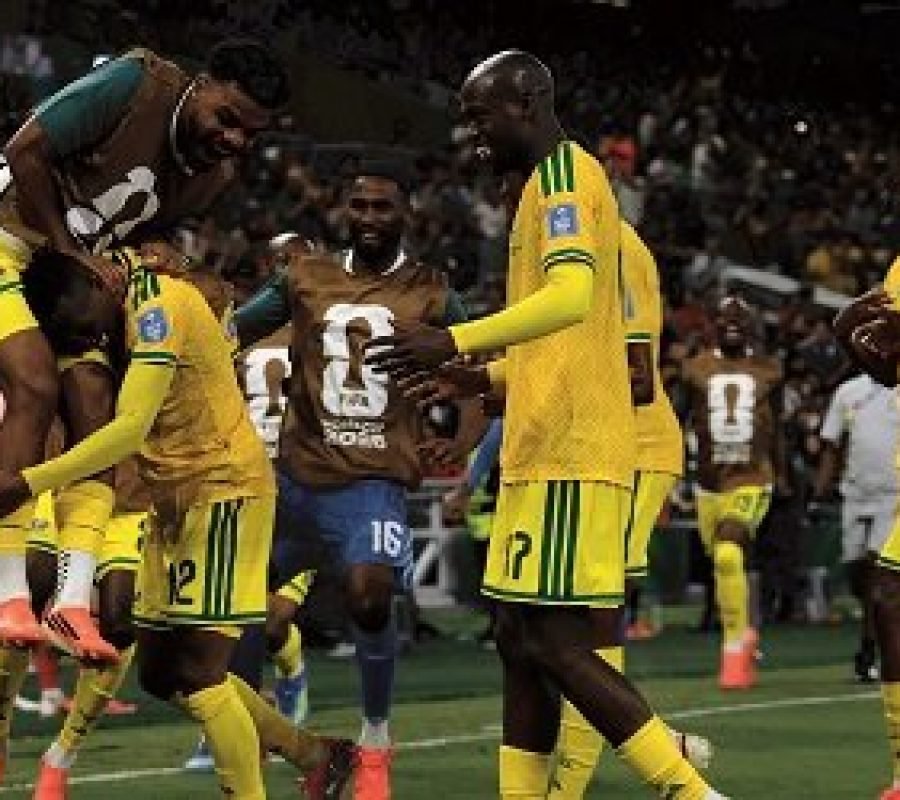 Thapelo-Maseko-is-mobbed-by-his-team-mates-after-scoring-the-only-goal